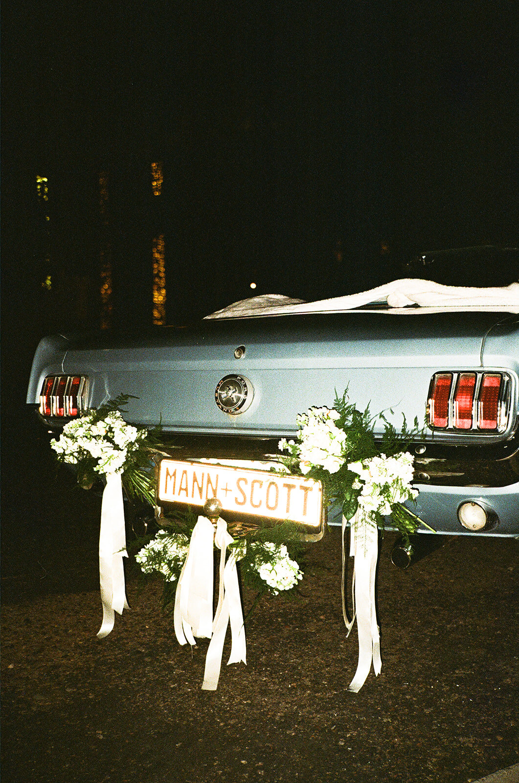 Sparkler exit, vintage Mustang and candlelit details at Royal Palms